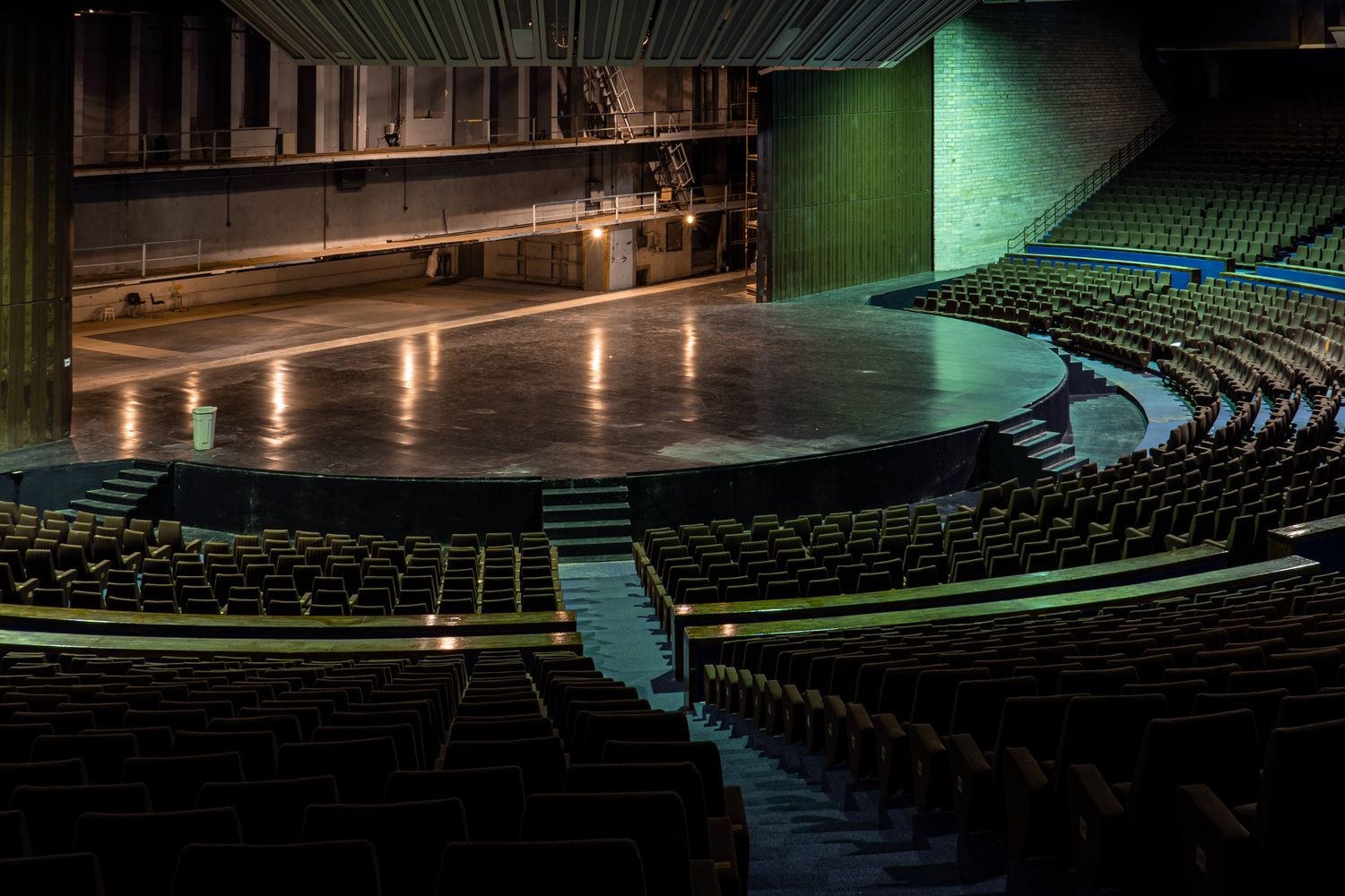 Empty cultural performance venue with curved rows of seats